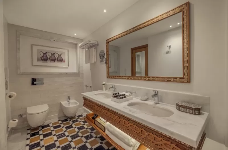 Luxurious room on Steigenberger Senator Nile Cruise – warm ambiance and refined interior design